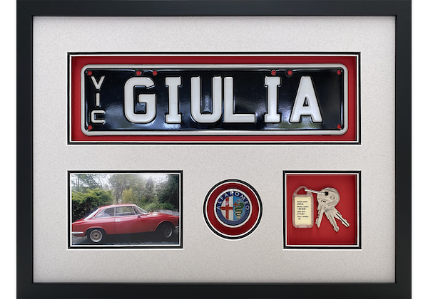 Framed Alfa Romeo memorabilia