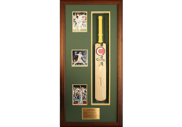 Framed Shane Warne Cricket Bat