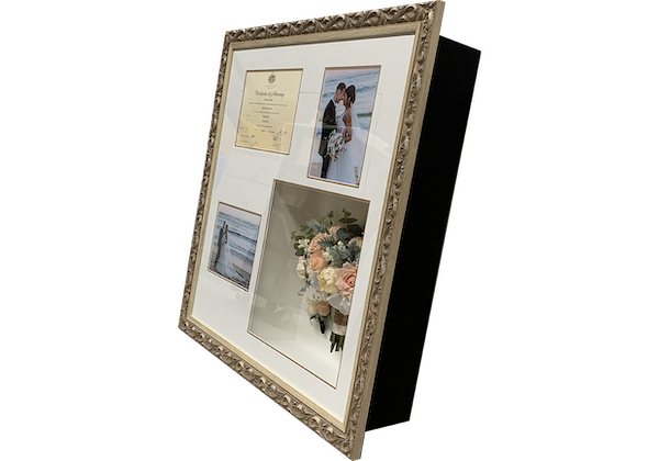 Framed Wedding photos and bouquet side view